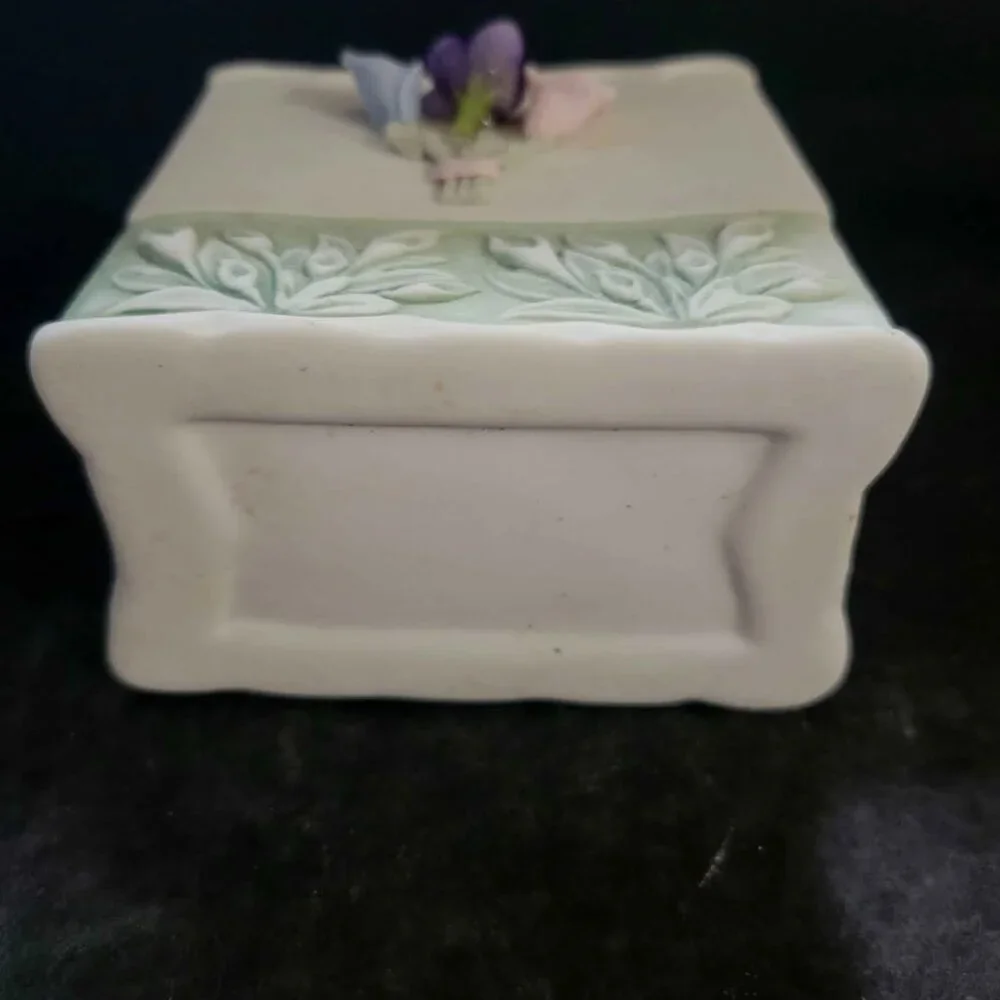 Vintage Porcelain Basket With Floral Embellishments And Decorative Ribbon